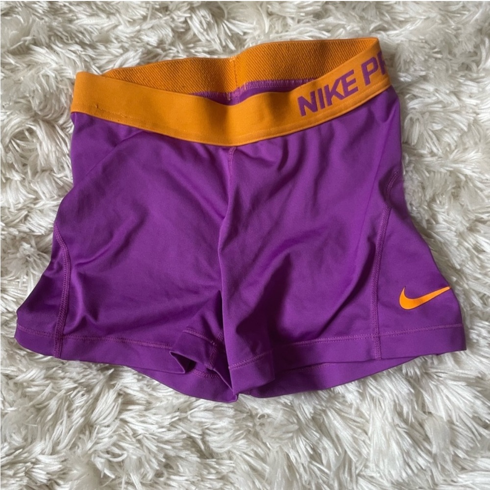 Purple and orange Nike pro shorts